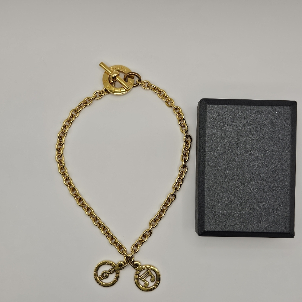 Vintage Celine golden chain necklace with music note charm